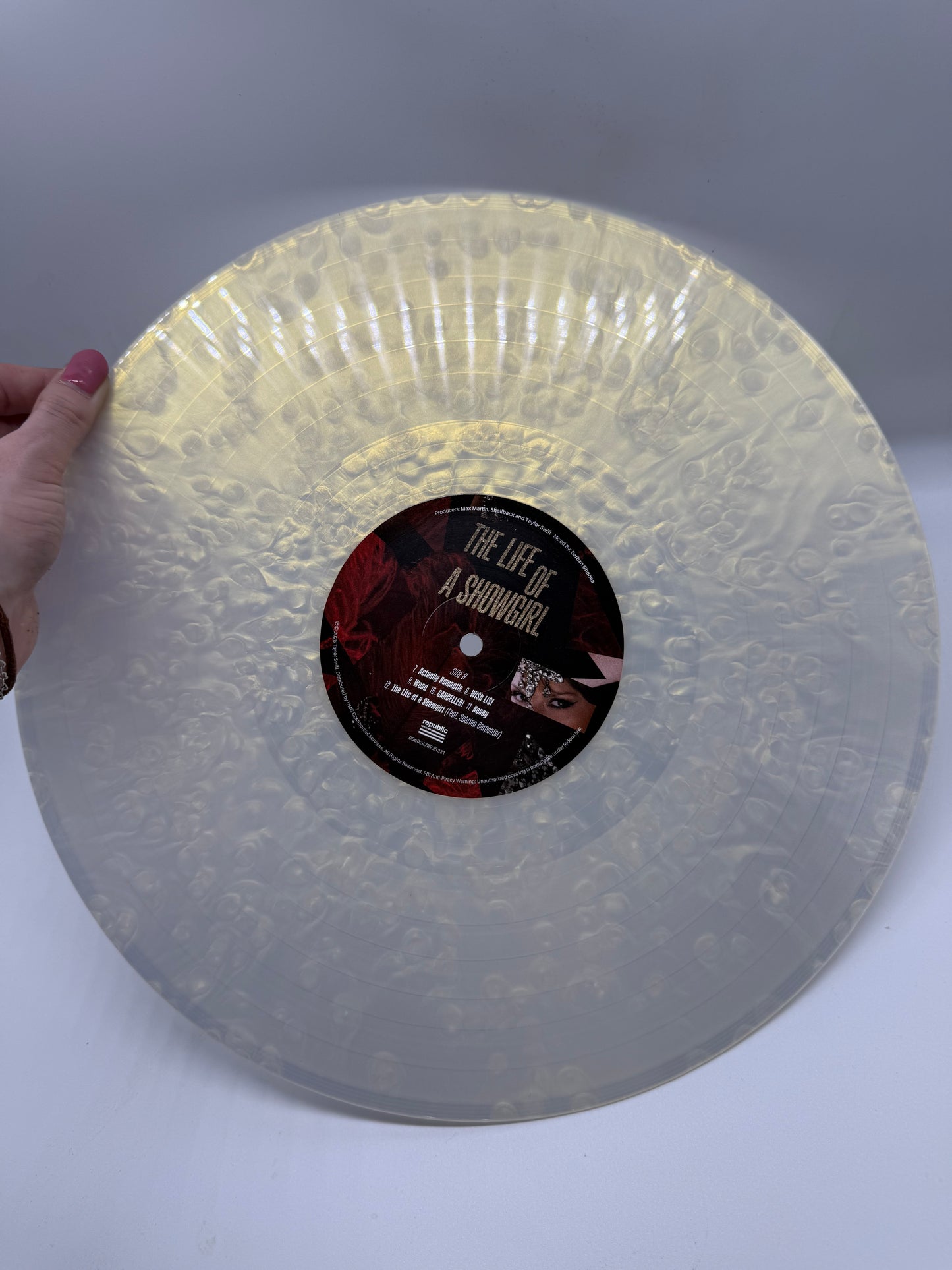 Taylor Swift - The Life of a Showgirl, (Tiny Bubbles in Champagne Edition Under Bright Lights Pearlescent Vinyl)